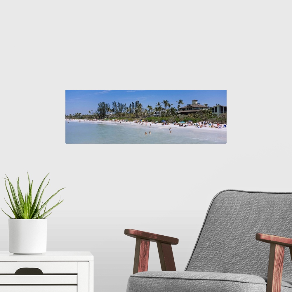 A modern room featuring Tourists on the beach, Naples Beach, Gulf of Mexico, Naples, Florida
