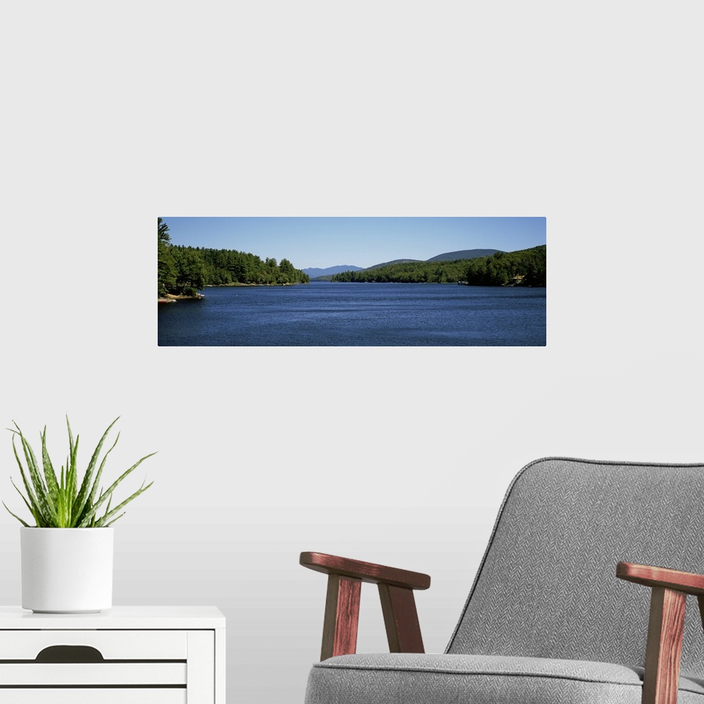A modern room featuring Trees on both sides of a lake, Long Lake, Adirondack State Park, New York State