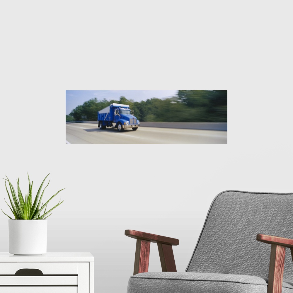 A modern room featuring Truck on a highway