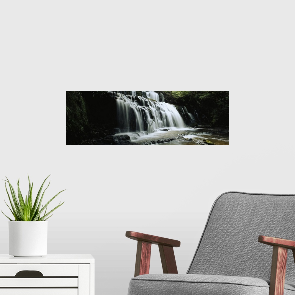 A modern room featuring Waterfall in a forest, Purakaunui Falls, The Catlins, South Island, New Zealand