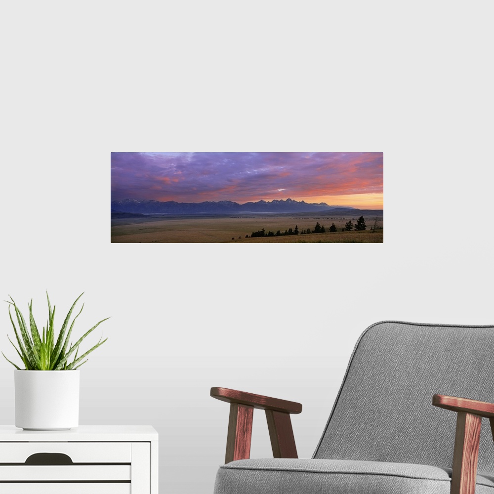 A modern room featuring Wyoming, Grand Teton National Park, Teton Mountains, Jackson Hole, Panoramic view of mountains at...