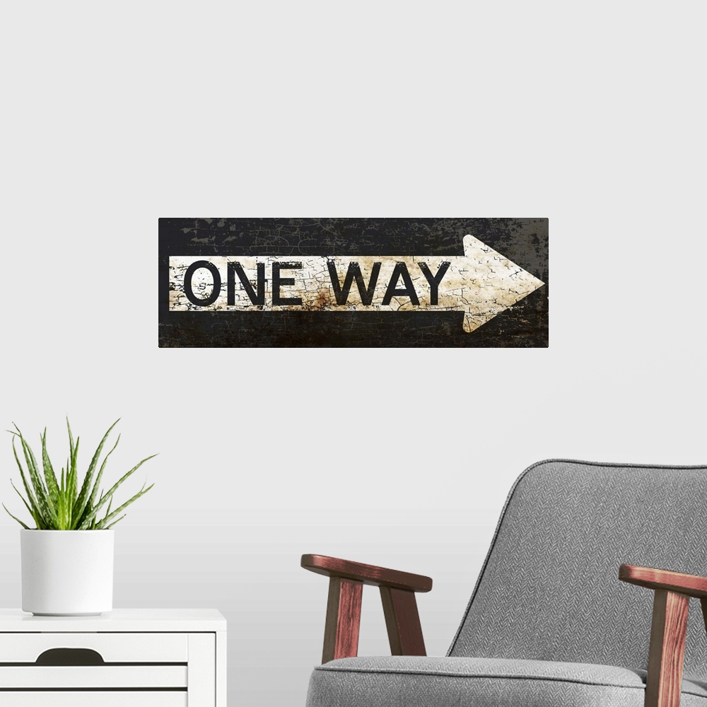 A modern room featuring A worn, distressed, cracked and rusty One Way street sign.