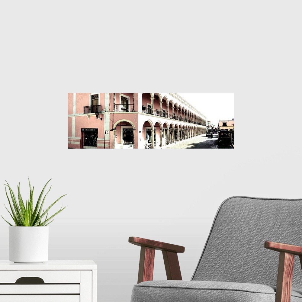 A modern room featuring Washed out panoramic photograph of a streetscape in Campeche, Mexico, with pink architecture. Fro...