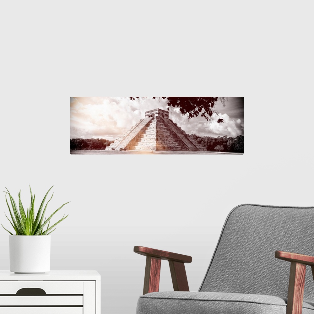 A modern room featuring Red toned panoramic photograph of El Castillo Pyramid in in Chichen Itza, Yucat?n, Mexico. From t...