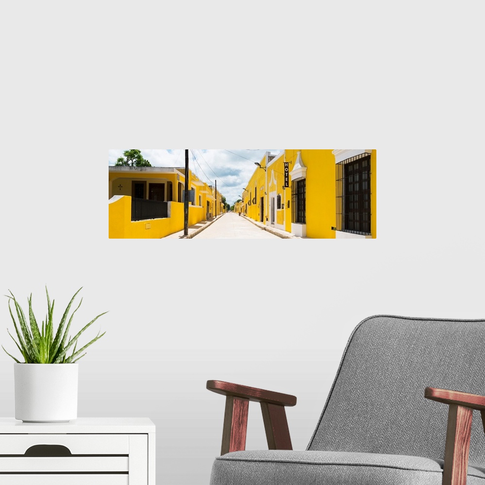 A modern room featuring Panoramic photograph of a bright streetcape in the Yellow City, Izamal, Mexico. From the Viva Mex...