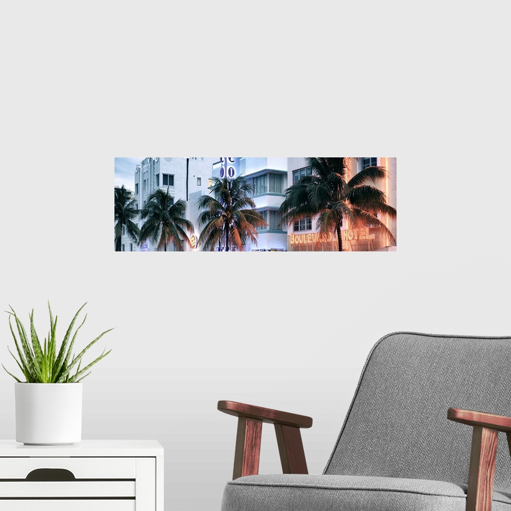 A modern room featuring Palm trees line the roads in Miami Beach, Florida.