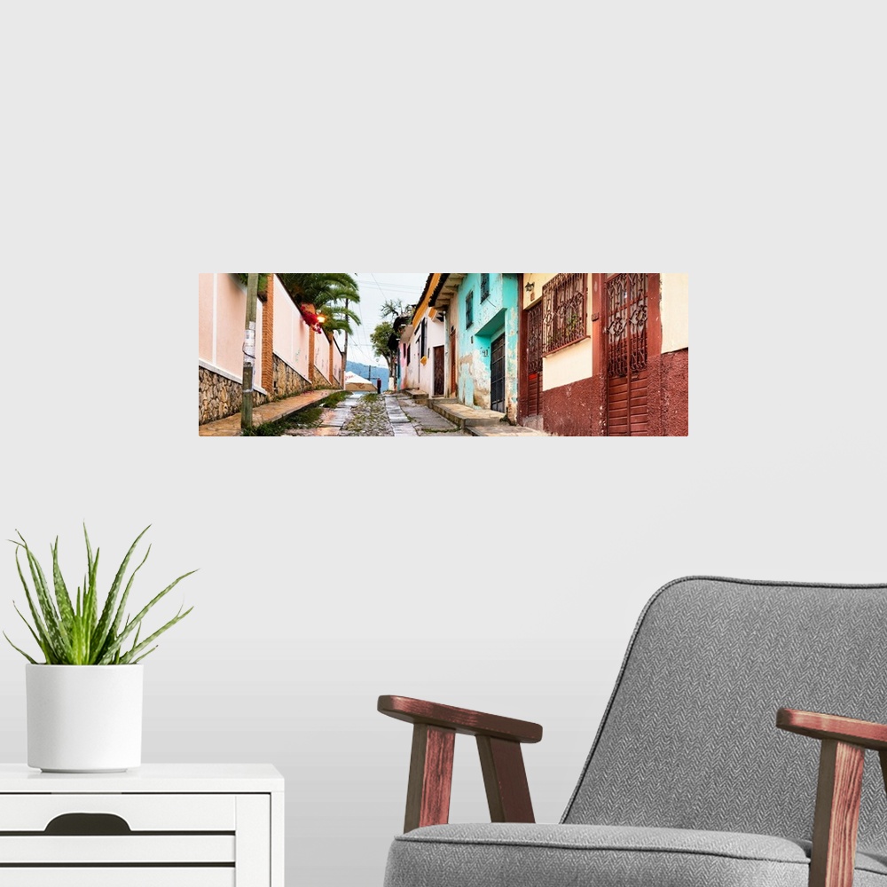 A modern room featuring Colorful panoramic photograph of a streetscape at San Cristobal de Las Casas in Chiapas, Mexico. ...