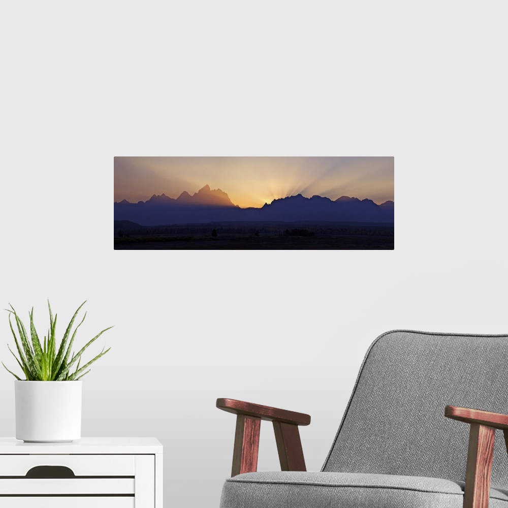 A modern room featuring Sunset over the Cathedral Group of mountains, Grand Teton National Park, Wyoming