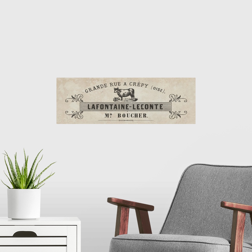 A modern room featuring Vintage label for a French butcher shop selling cuts of beef.