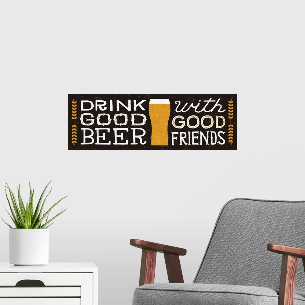 A modern room featuring Retro style sign reading "Drink good beer with good friends" with a glass of beer in the center.