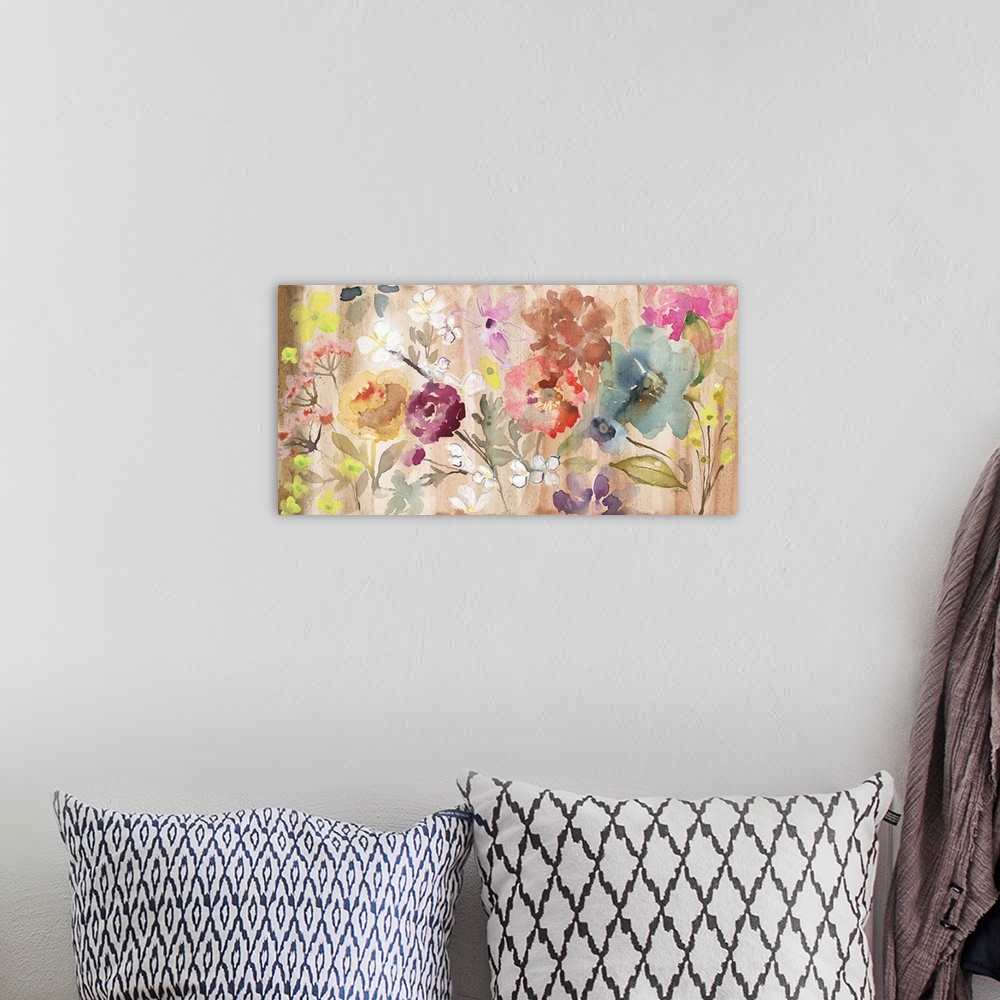 A bohemian room featuring Watercolor artwork of a variety of blooming flowers in warm shades of pink and red.