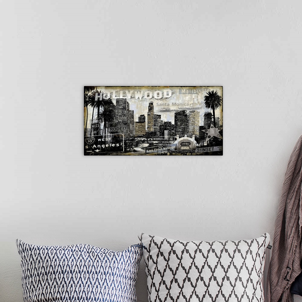 A bohemian room featuring Home decor with a cityscape of LA/Hollywood in black and sepia tones with well-known street signs...