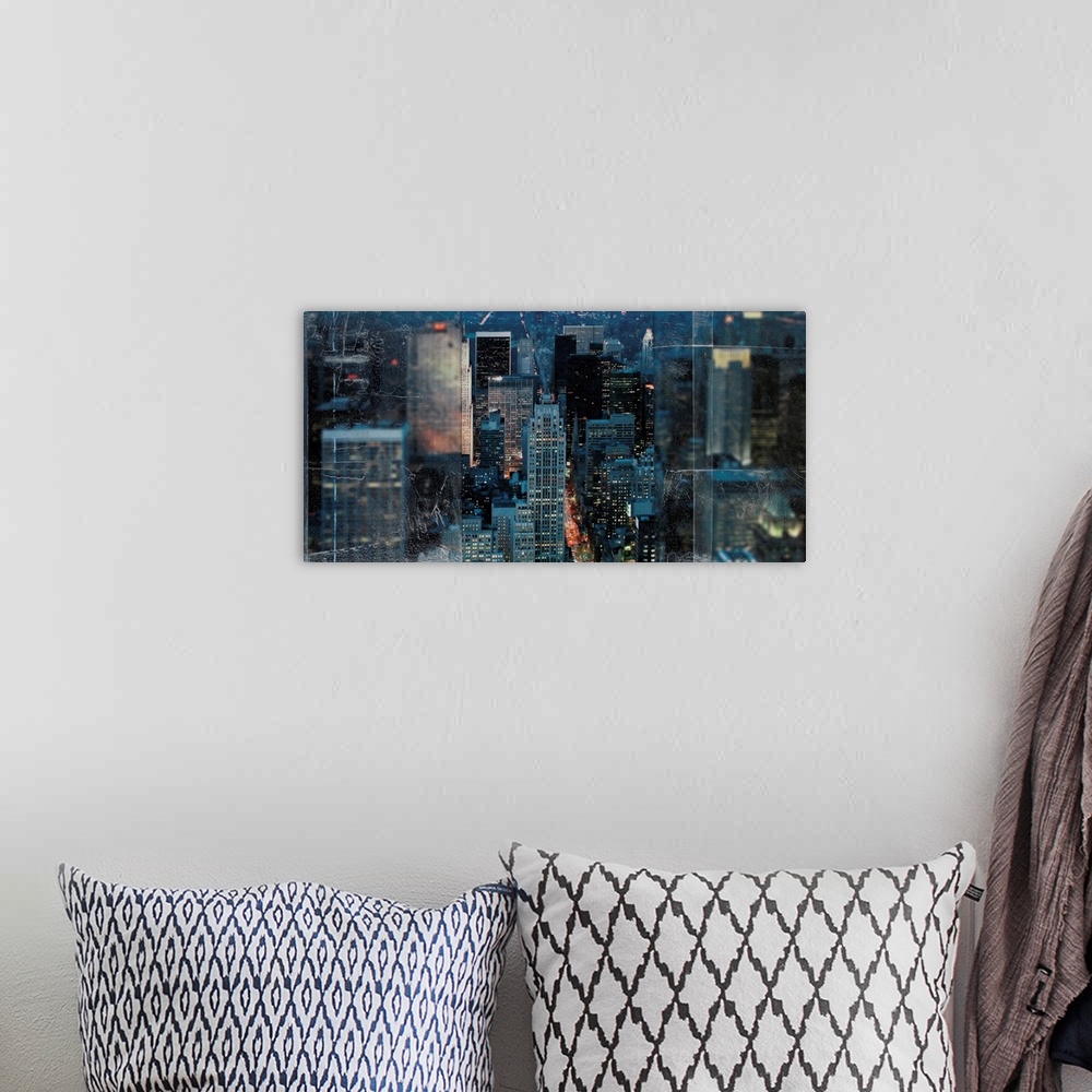 A bohemian room featuring An image composite of the city skyline of New York framed with a textured screen on both sides.