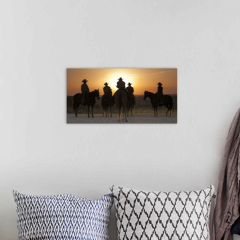 A bohemian room featuring Cowboys and cowgirl at sunrise, Weatherford, Texas.