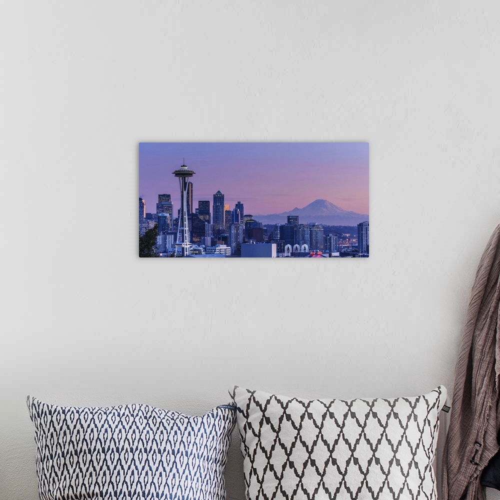 A bohemian room featuring Mount Rainier in the background.