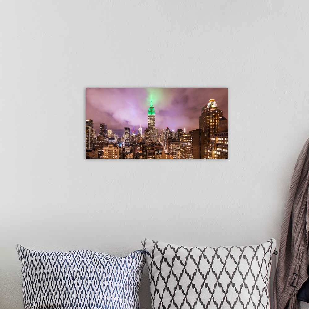 A bohemian room featuring Empire state building and view of the rooftops of Manhattan, New York, USA.