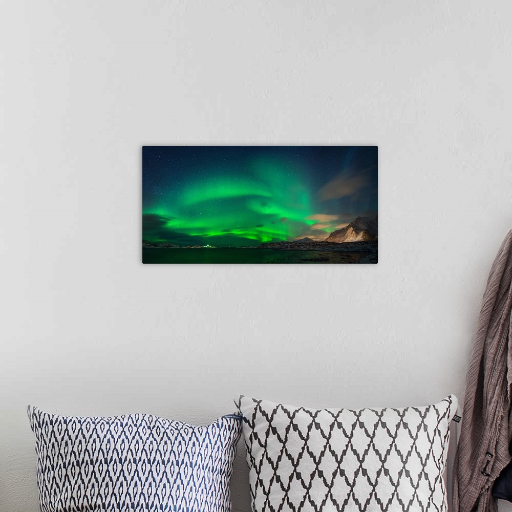 A bohemian room featuring Aurora borealis above Ramberg, Lofoten, Nordland, Norway.