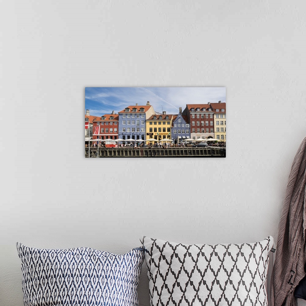 A bohemian room featuring Colorful houses in the city along Nyhavn, Copenhagen, Denmark