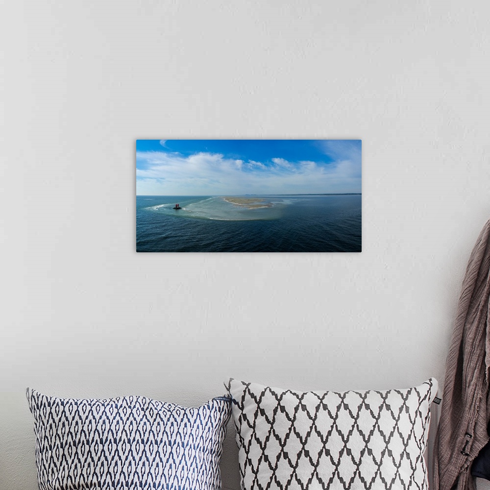 A bohemian room featuring View of sea against cloudy sky, Limfjord, Jutland, Denmark