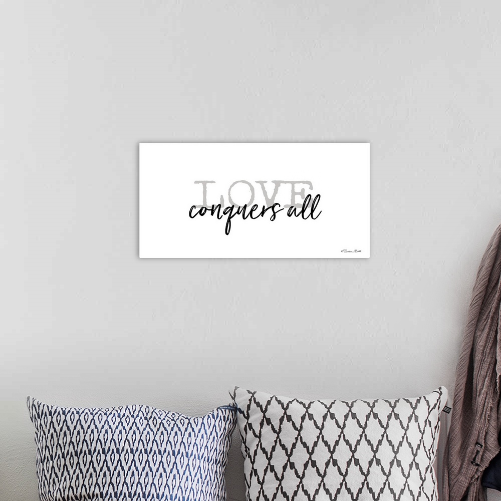 A bohemian room featuring Simple elegant typography artwork.