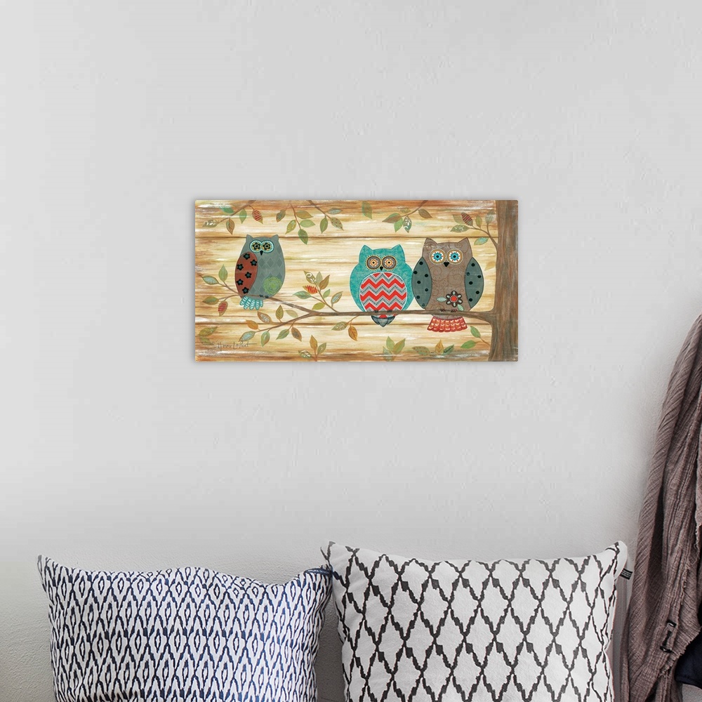 A bohemian room featuring Cute illustration of three owls with floral designs, perched on leafy branches.