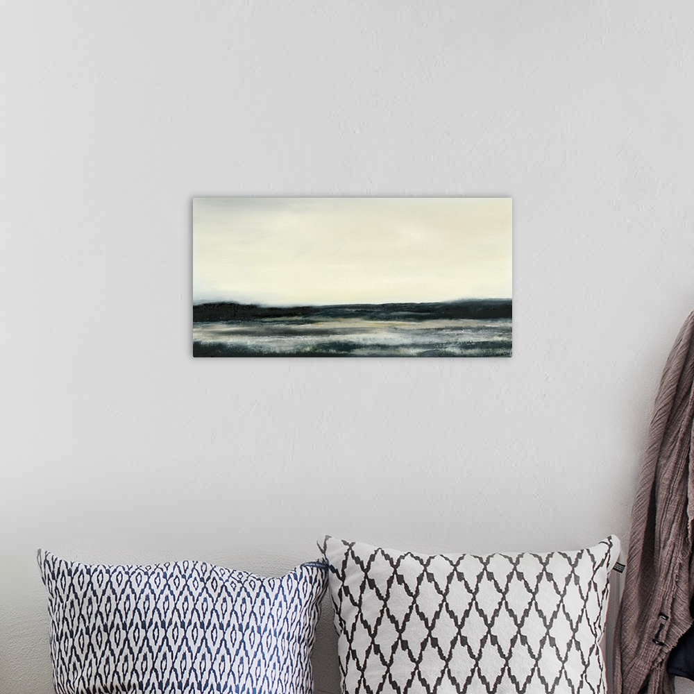 A bohemian room featuring Contemporary seascape painting of dark ocean waters under a pale yellow sky.