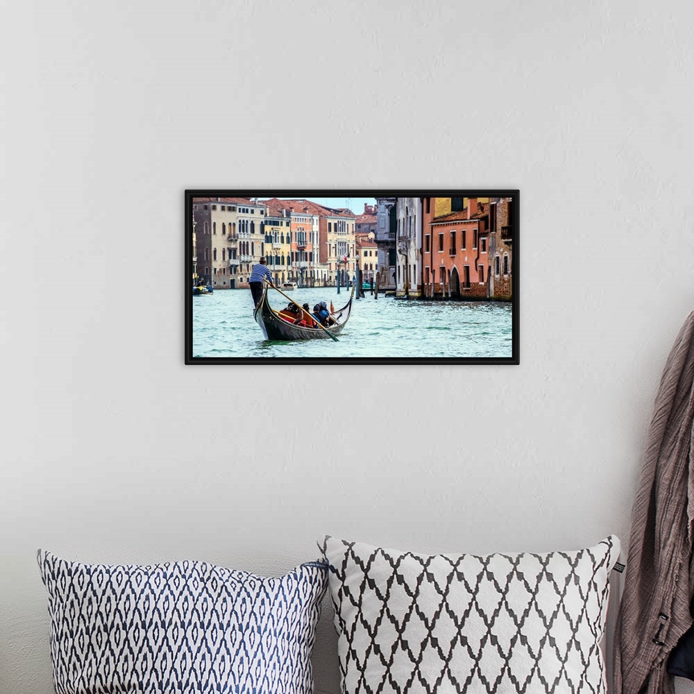 A bohemian room featuring Photograph of the rear side of a gondola rowing through Grand Canal in Venice.