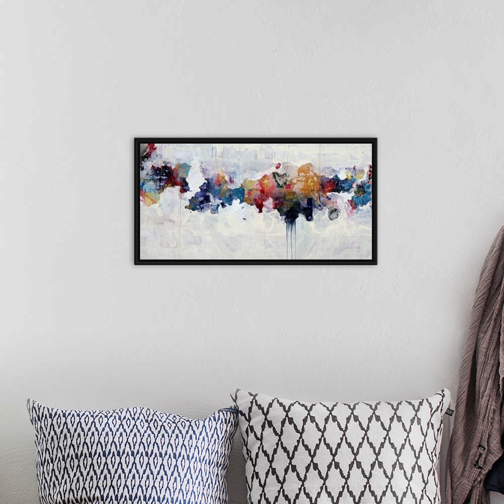 A bohemian room featuring Abstract painting of a spectrum of dull colors arranged across the image with drips falling from ...