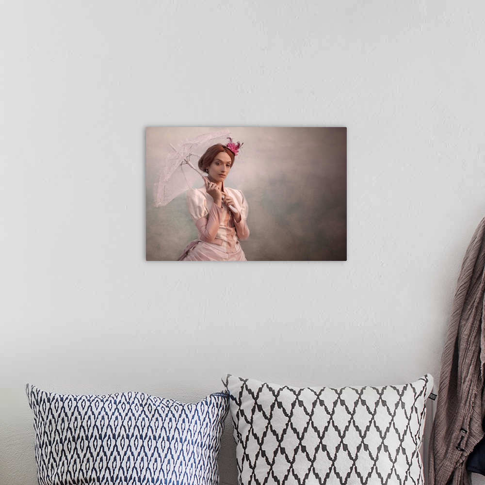 A bohemian room featuring Portrait of a woman in a pink dress with a lacy parasol.