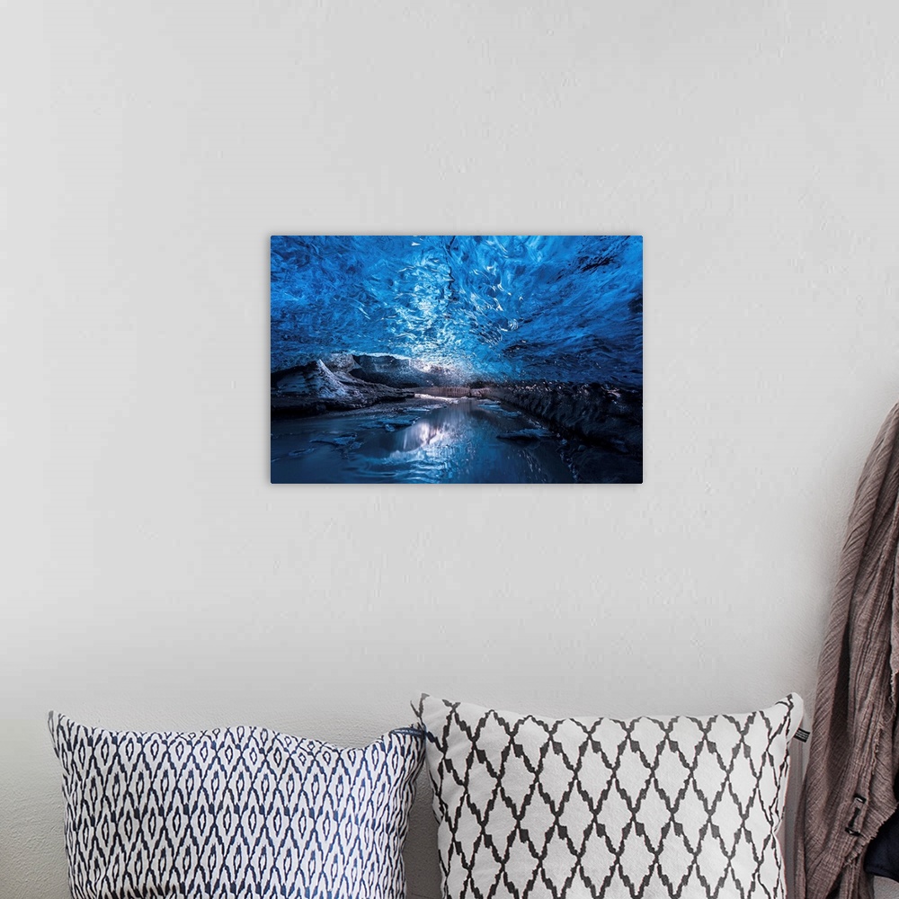 A bohemian room featuring A view of the ceiling of an ice cave from inside it, Iceland.