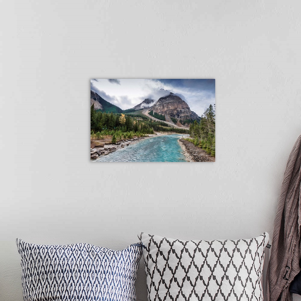 A bohemian room featuring Kicking Horse River adjacent to city of Field, Canada