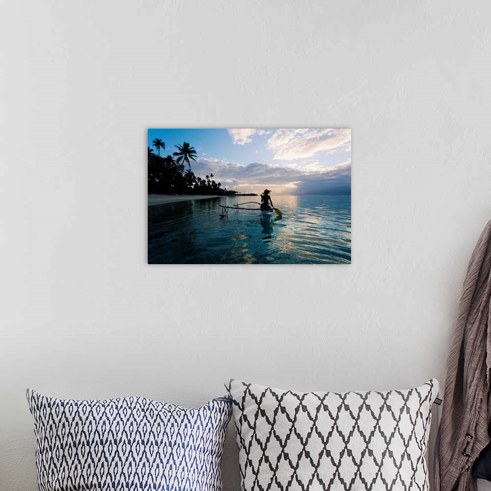 A bohemian room featuring French Polynesia, Moorea, Woman Paddling In Outrigger Canoe Along Shoreline