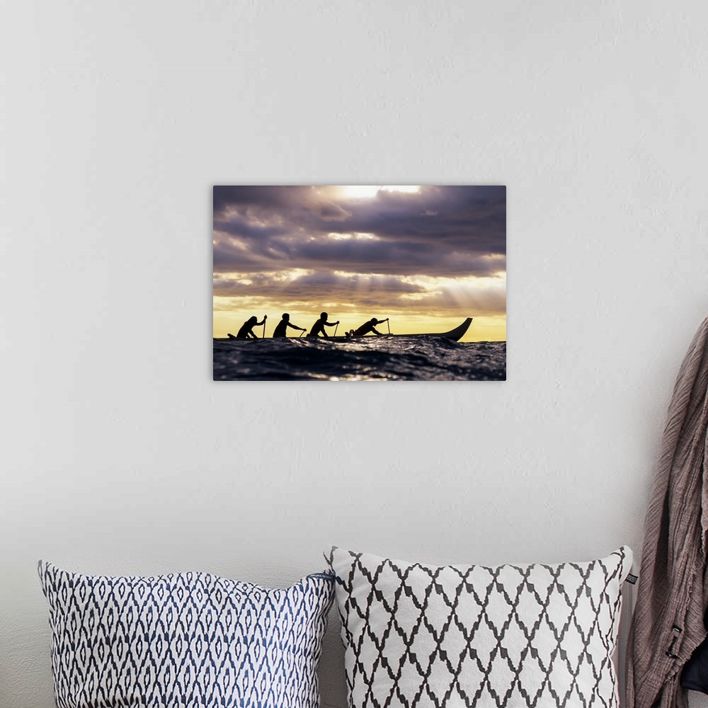 A bohemian room featuring Outrigger Canoe And Paddlers Silhouetted At Sunset, Sunrays Through The Clouds