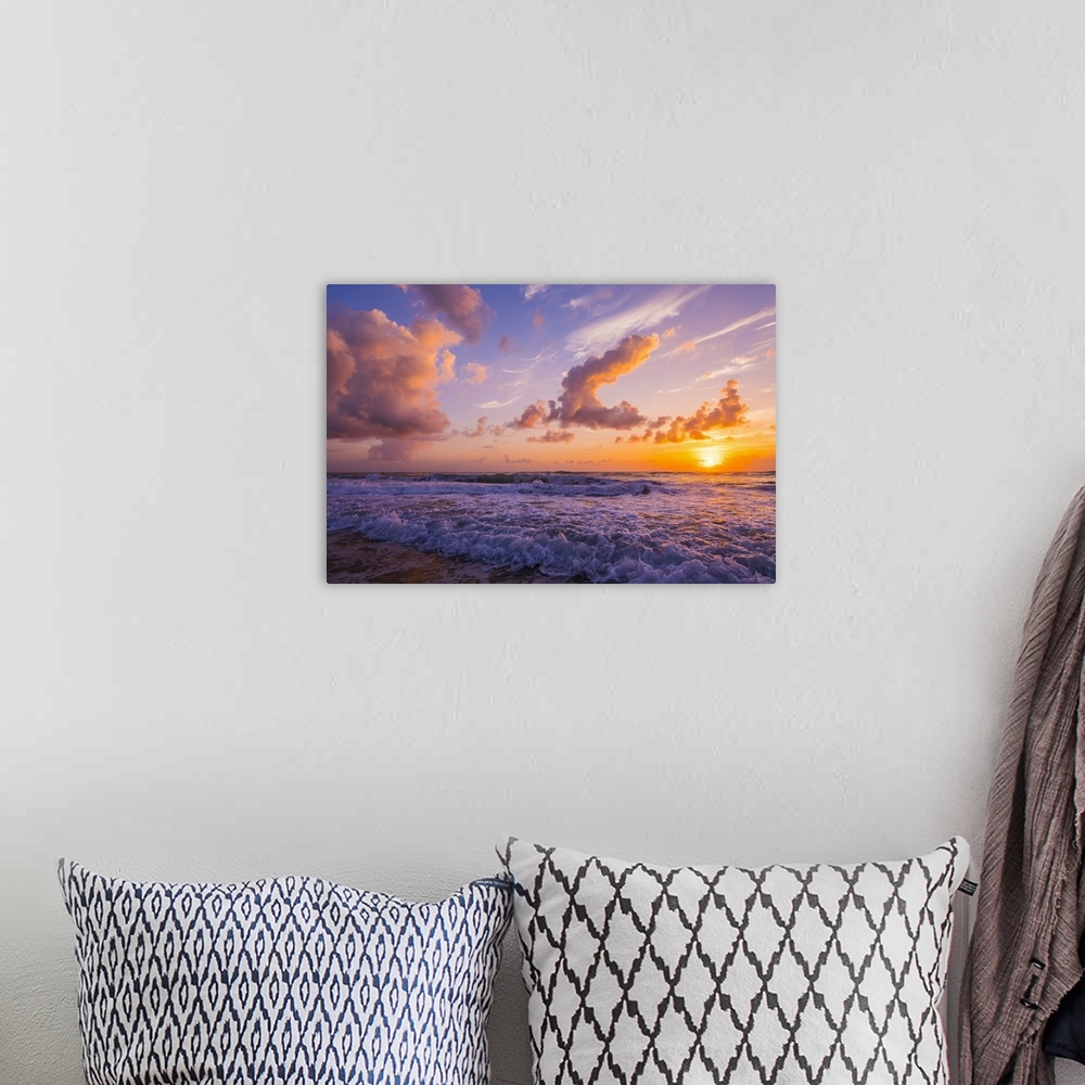 A bohemian room featuring Sunrise over the Atlantic Ocean with the surf washing up on the shore; Indialantic, Florida, Unit...