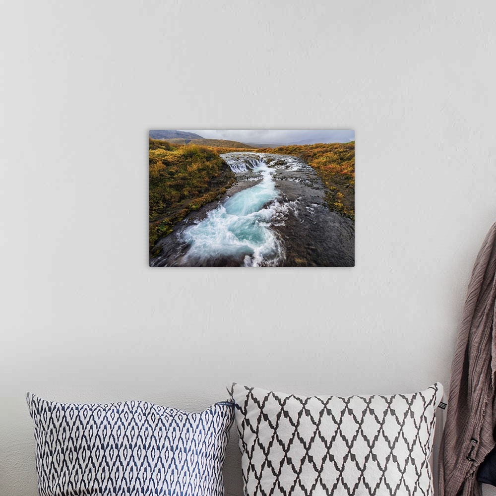 A bohemian room featuring Waterfall And Flowing Water In A River, Bruarfoss, Iceland