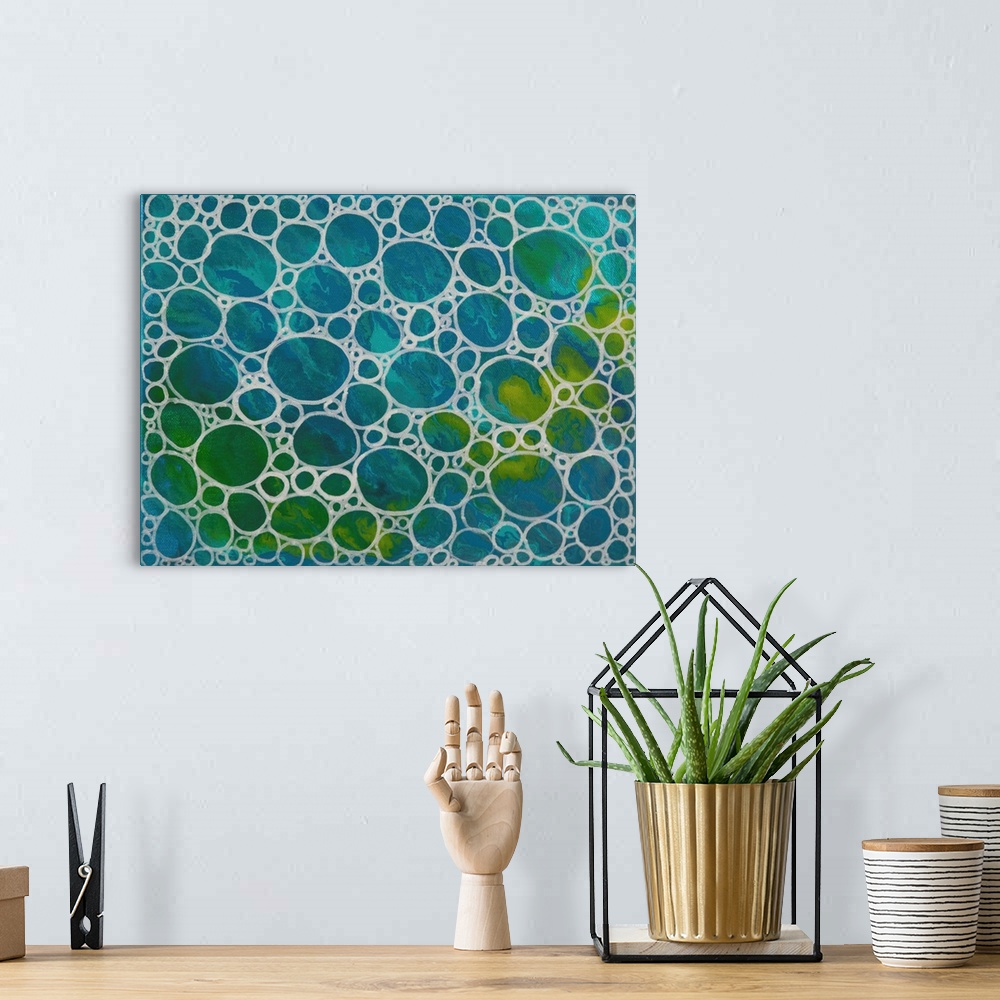 A bohemian room featuring Contemporary abstract artwork of a close-up view of concentrated air bubbles illuminated by satur...
