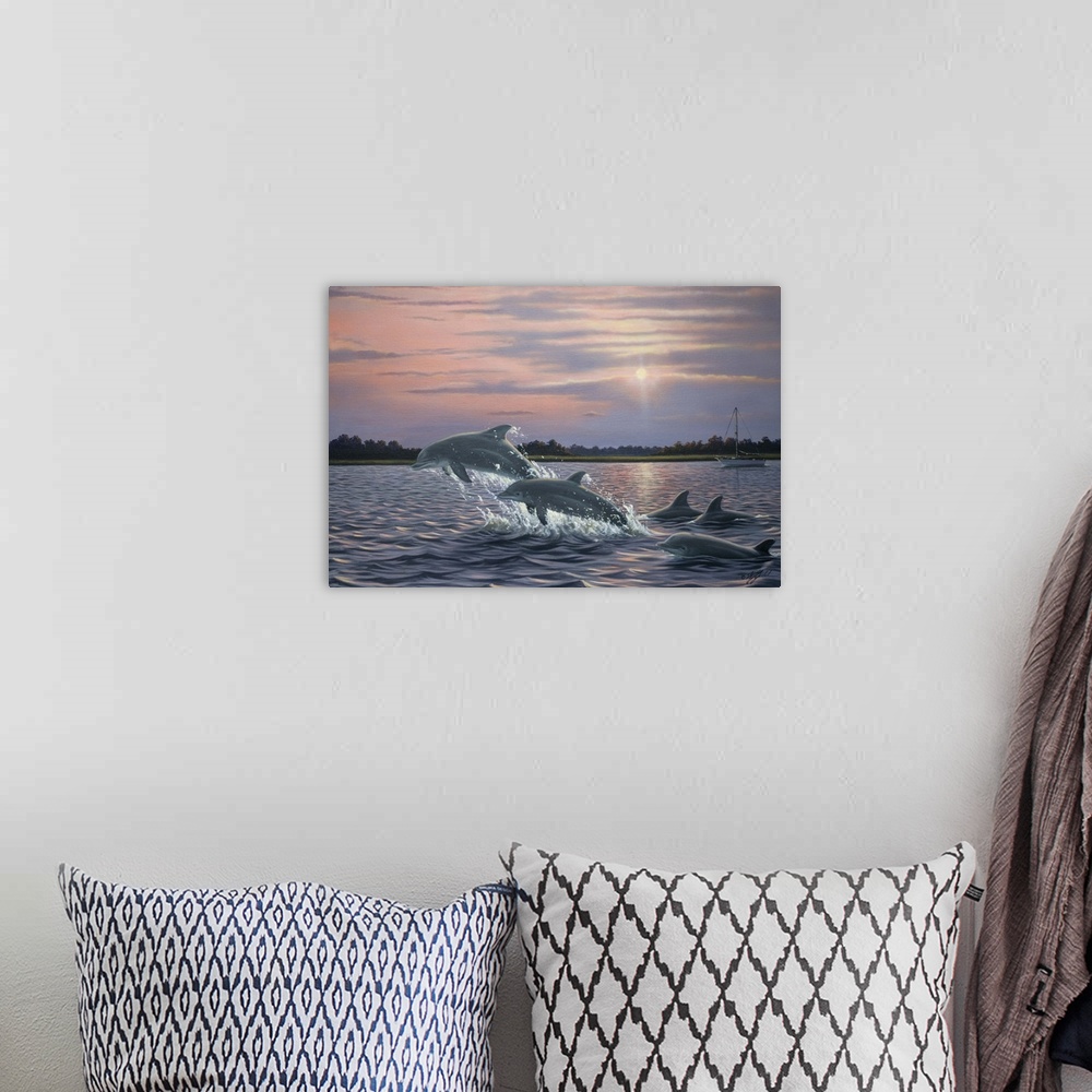 A bohemian room featuring Contemporary artwork of dolphins breaching and leaping out of the water.