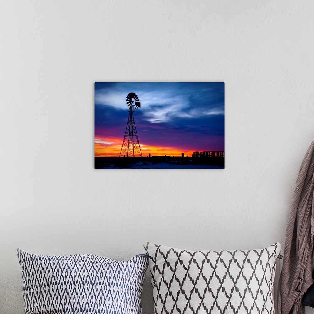 A bohemian room featuring Windmill on a farm at sunrise, color photography