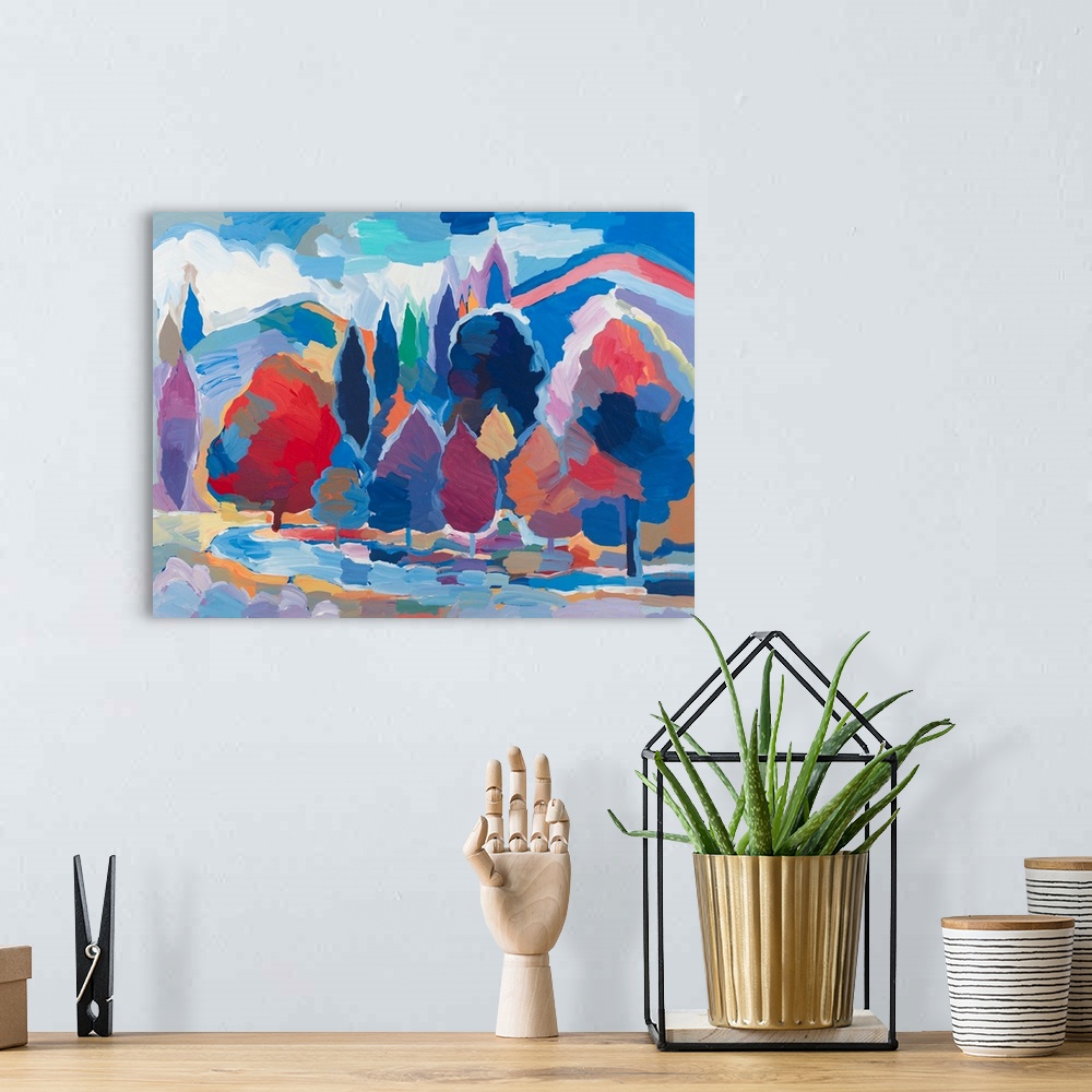 A bohemian room featuring Colorful abstract landscape with trees and mountains lining the side of a stream.