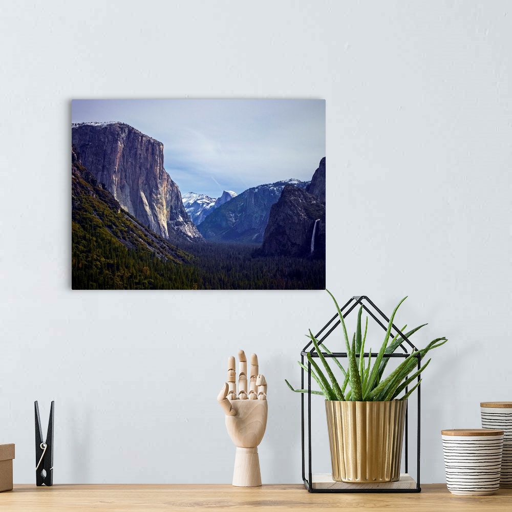 A bohemian room featuring An artistic photograph of Yosemite National Park in California.