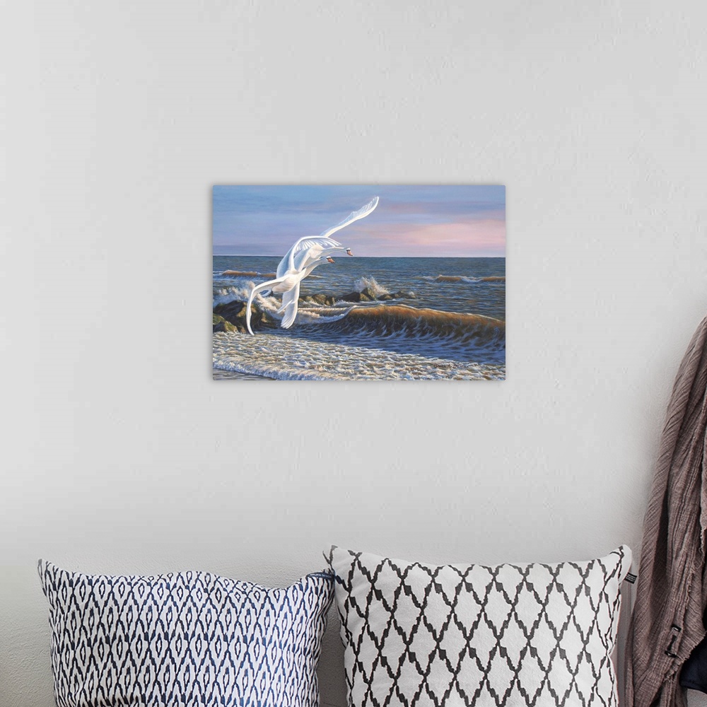 A bohemian room featuring Contemporary artwork of swans flying along the edge of a beach,