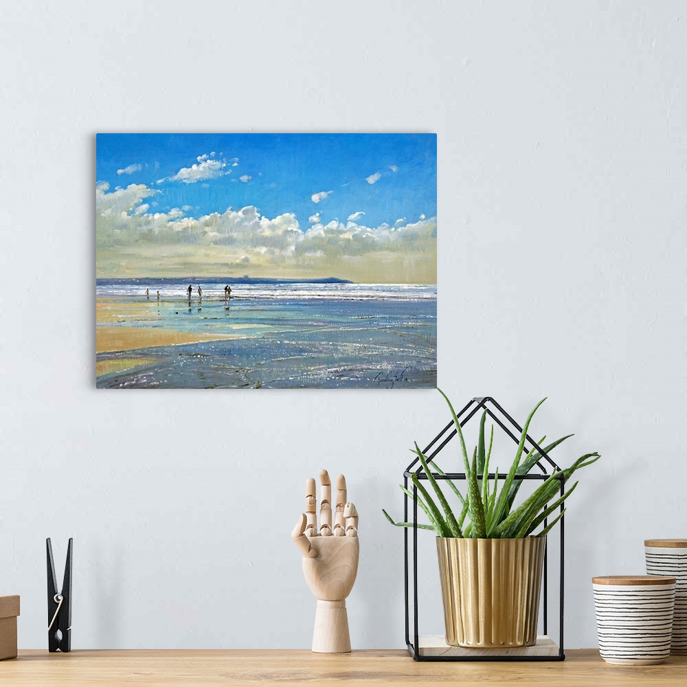 A bohemian room featuring Oversized, horizontal painting of a small group of people in the distance, walking the shoreline ...