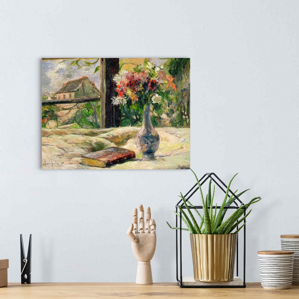 A bohemian room featuring Large impressionalistic painting of a vase of flowers by a book near a window with a cottage outs...
