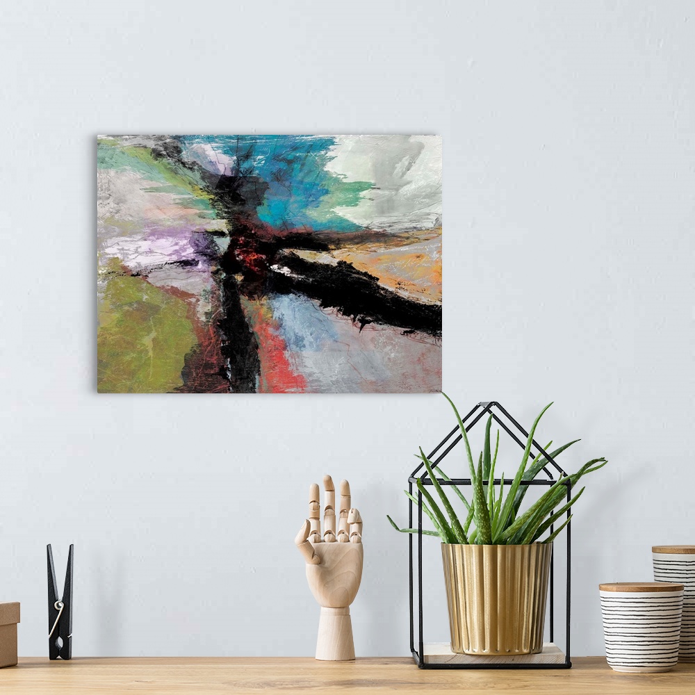 A bohemian room featuring Colorful abstract painting with bold black brushstrokes moving out from the middle.