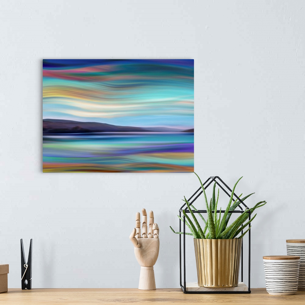 A bohemian room featuring Large abstract art with a colorful and wavy landscape.