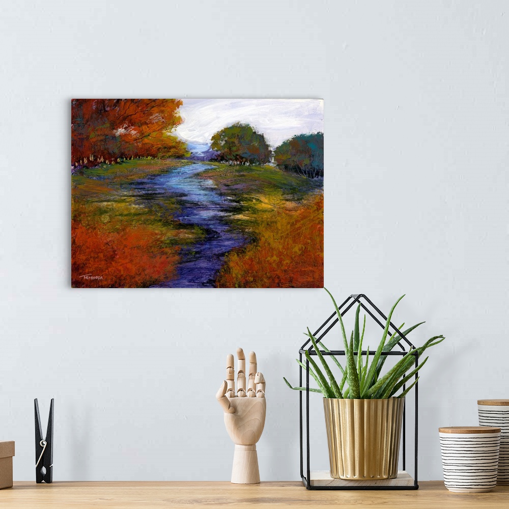 A bohemian room featuring Contemporary painting of a landscape with Autumn trees and a blue and purple tinted creek flowing...