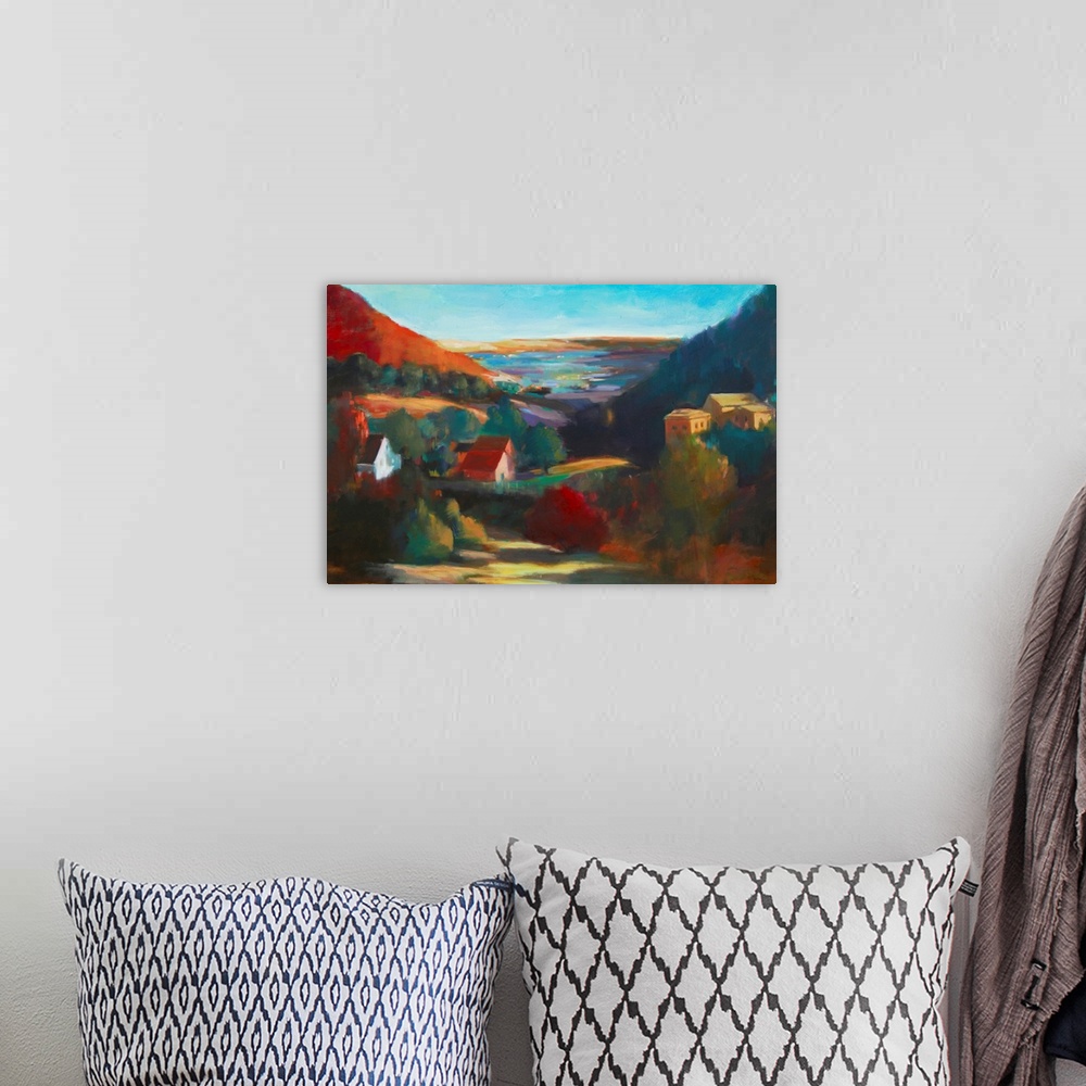 A bohemian room featuring Contemporary landscape painting of a small town in a colorful valley surrounded by mountains.