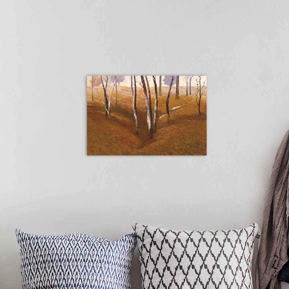 A bohemian room featuring Horizontal landscape of a group of bare trees in fall done with short, small brush strokes.