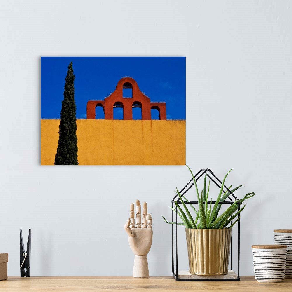 A bohemian room featuring Blue sky, city wall and Cypress Tree.