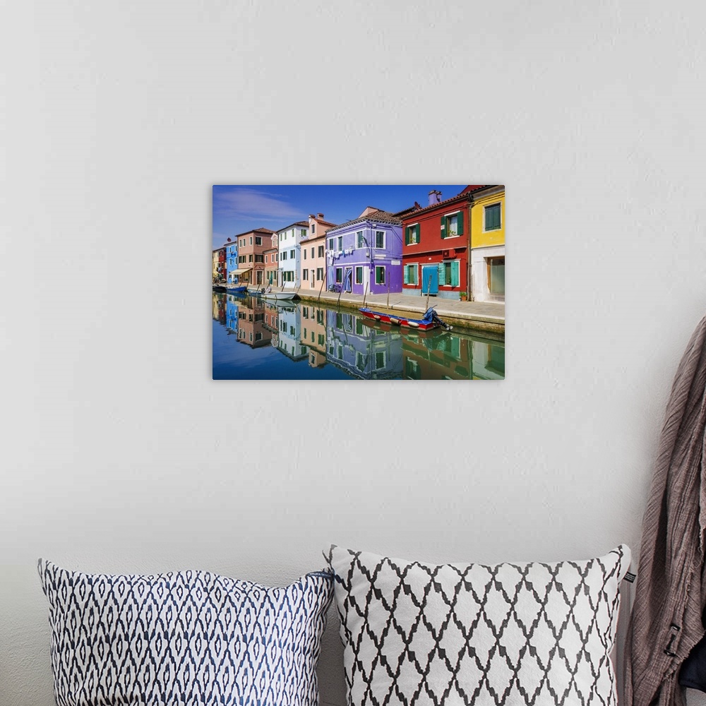 A bohemian room featuring Colorful houses and canal, Burano, Veneto, Italy.
